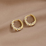 TWYLA | TWIRLED PEARL CREOLEN