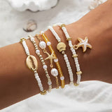 CORALIA | KÜSTEN-GOLD & PERLEN ARMBAND-SET, 6-TLG.