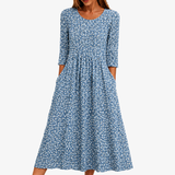 ISLA | BLUE DAISY GARDEN MAXI-KLEID MIT TASCHEN