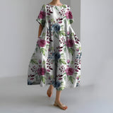 MEERI | KÜNSTLERISCHES MAXIKLEID MIT VINTAGE-BLUMENMUSTER UND UNBEKÜMMERTER ELEGANZ
