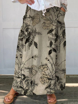 JAIZY | ROCK MIT RETRO-BLUMENMUSTER UND ELASTISCHEM BUND MIT TASCHEN