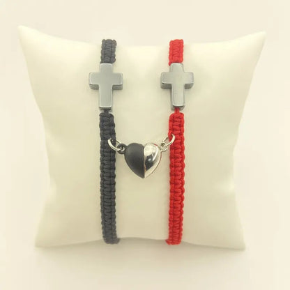 ARMBAND MIT KREUZ- UND HERZ-ANHÄNGER