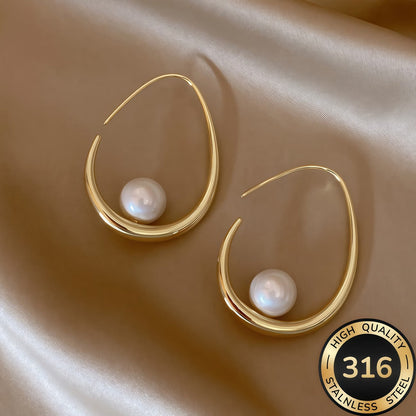 SELENA | CRESCENT PEARL CREOLEN
